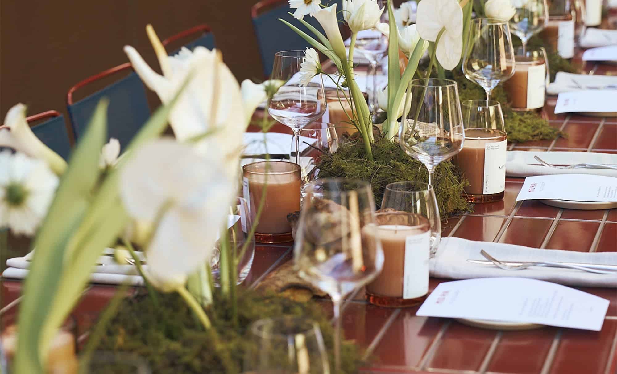 Elegant dinner table setting for the Nude Lucy collection event